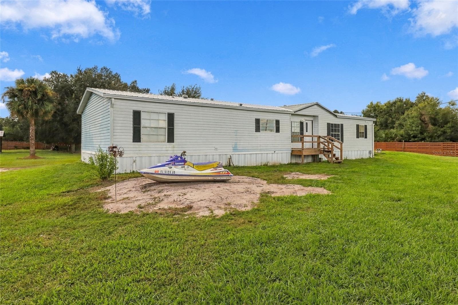 Manufactured Home at 19046 NW 302ND ST, OKEECHOBEE, photo 4 of 52