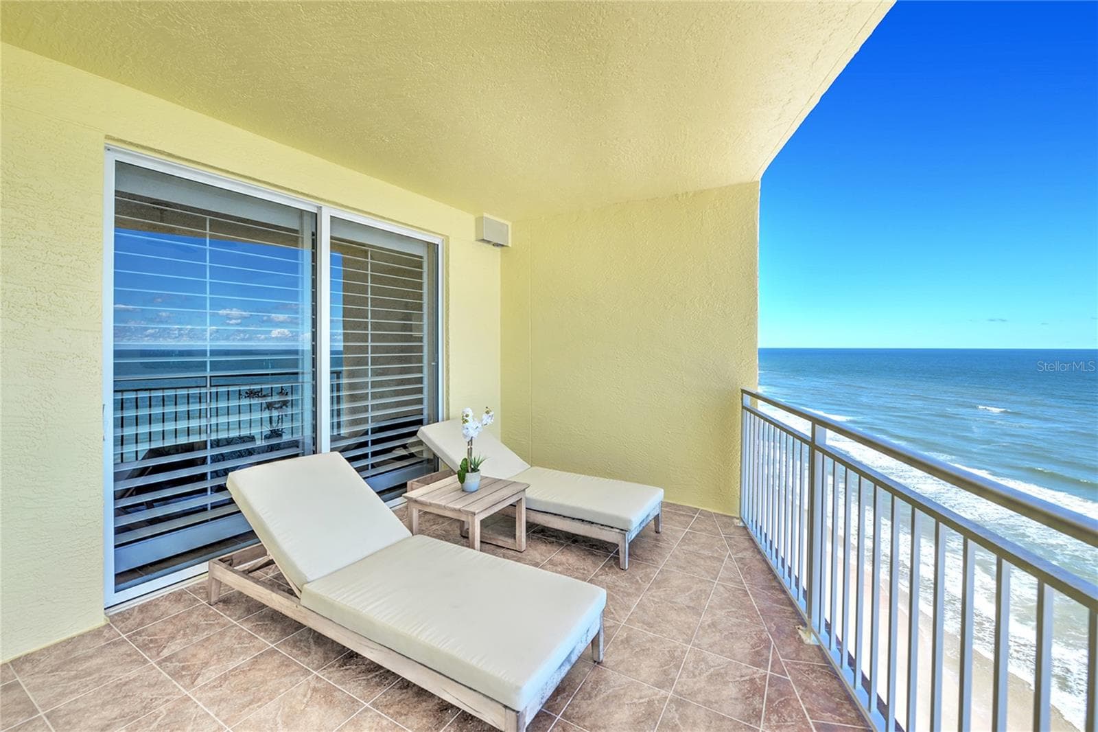 Primary Suite balcony. - 1900 N ATLANTIC AVE #1603, DAYTONA BEACH