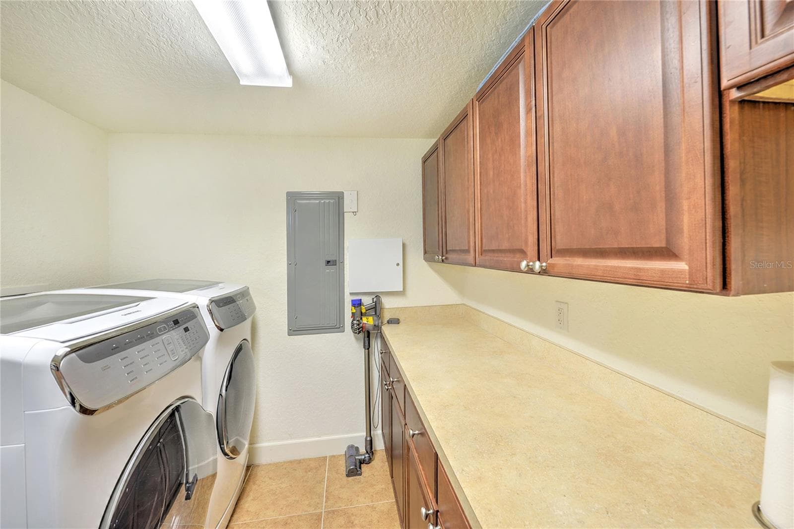 Utility Room with plenty of counter space. - 1900 N ATLANTIC AVE #1603, DAYTONA BEACH