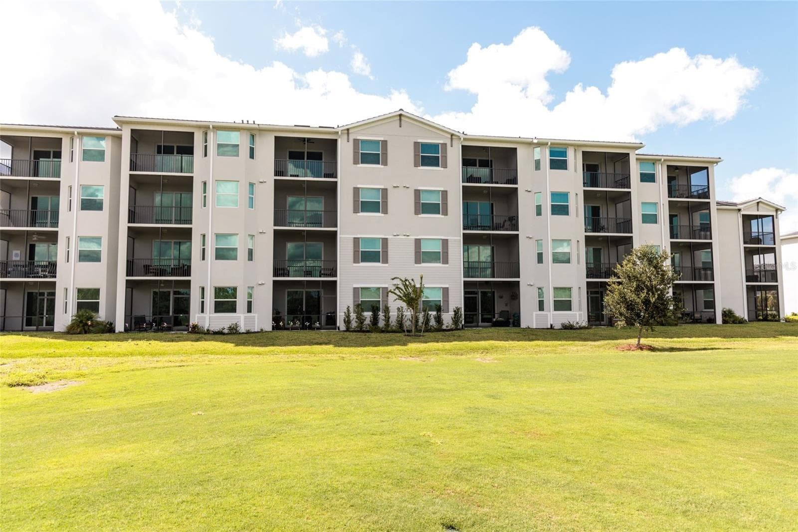 Exterior View Back - 17600 OPAL SAND DR #402, VENICE