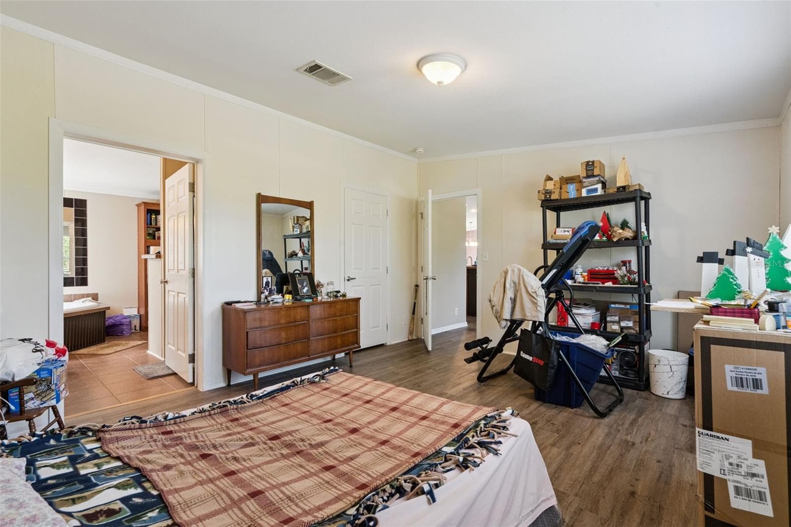 Featuring a Walk-in Closet & Private Ensuite Bath - 2478 BUCK BOARD TRL, LAKE WALES
