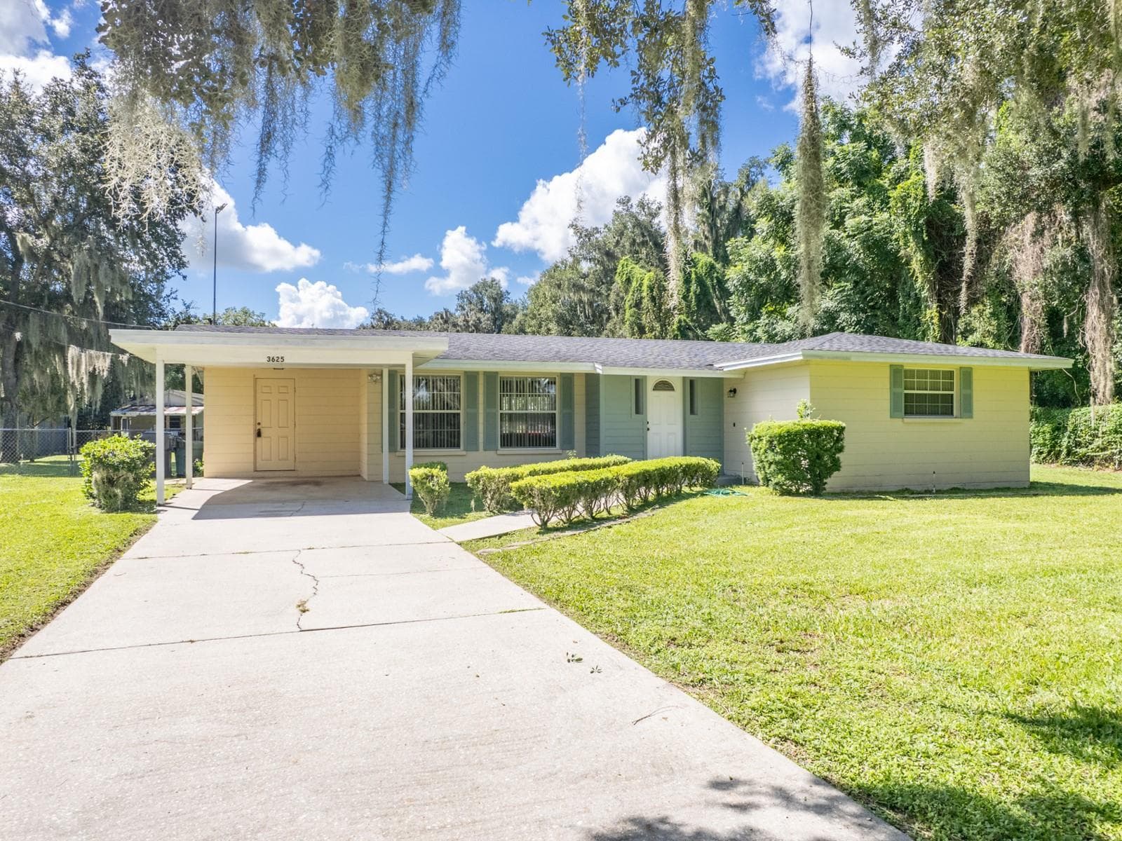 Front of the home with a one car carport. - 3625 E GANDY RD, BARTOW