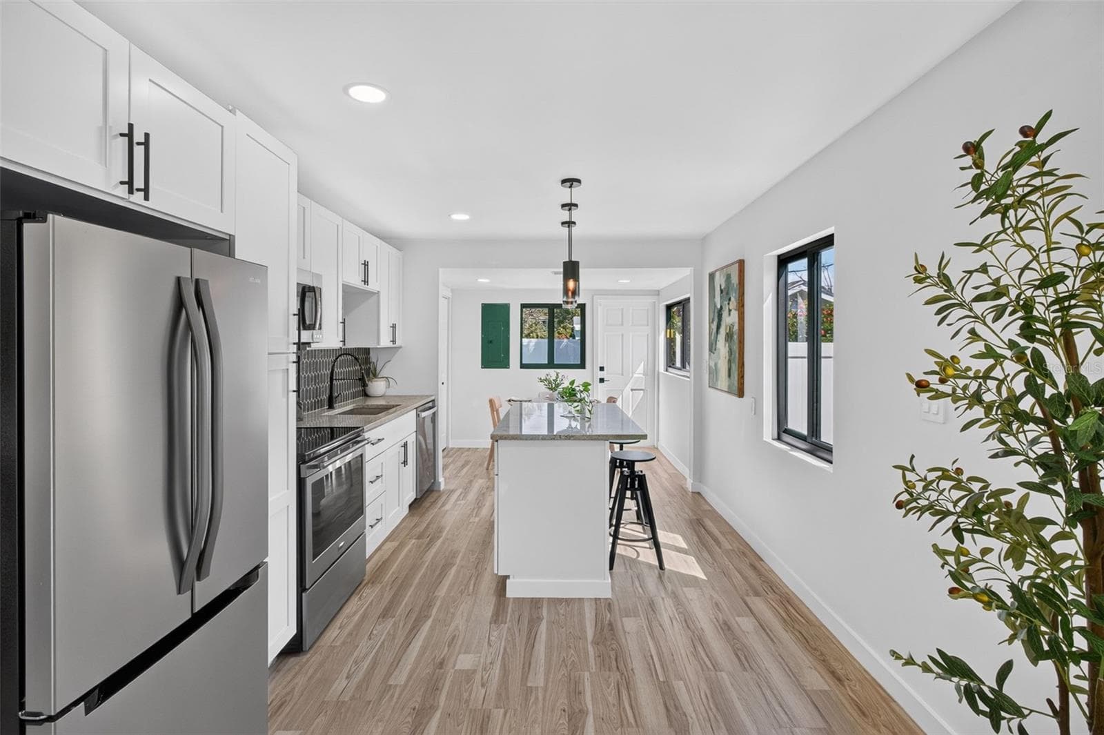 View to kitchen from living room - 711 19TH AVE S, ST PETERSBURG