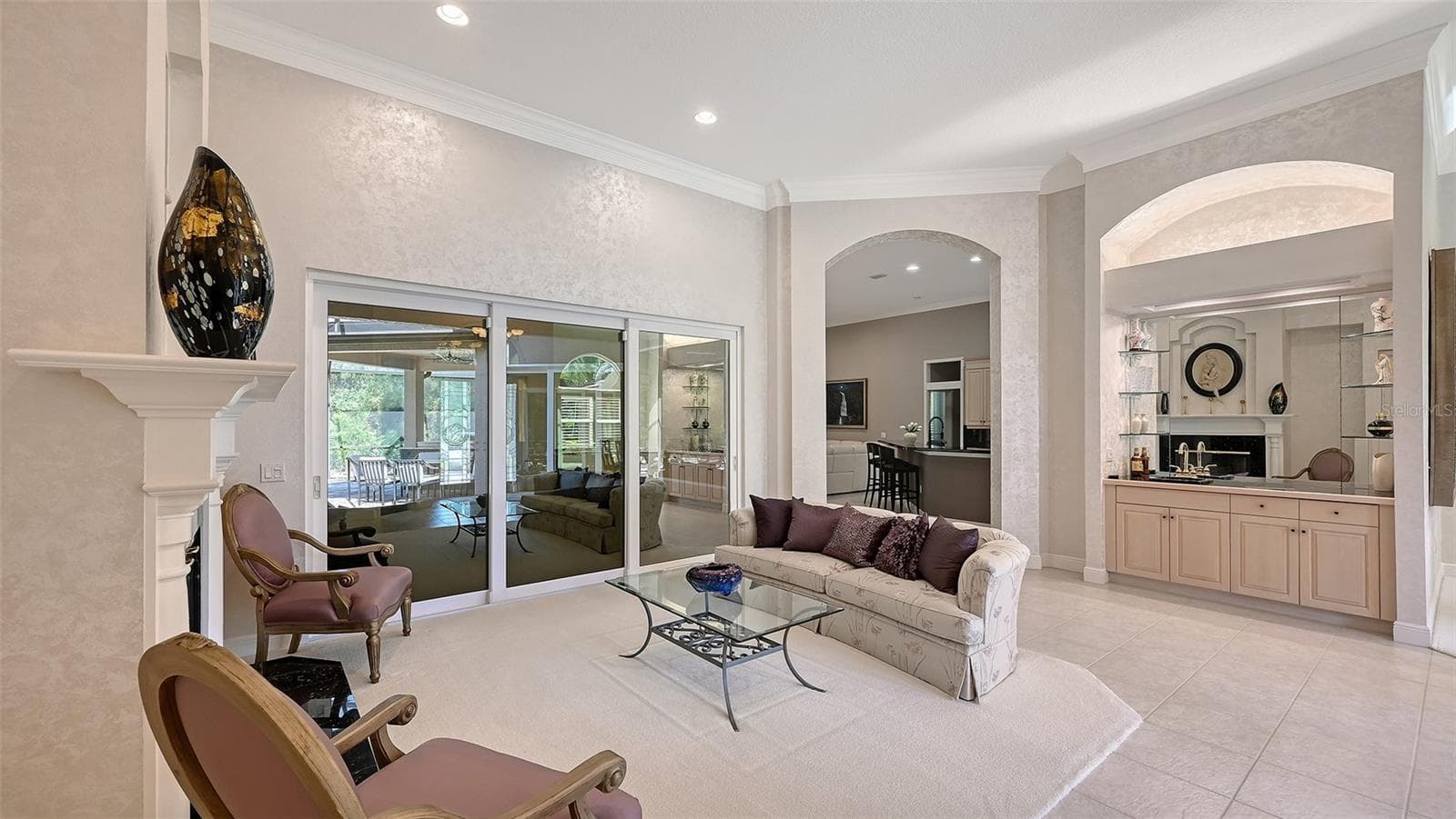 Separate Living Room with wet bar. - 8866 BLOOMFIELD BLVD, SARASOTA