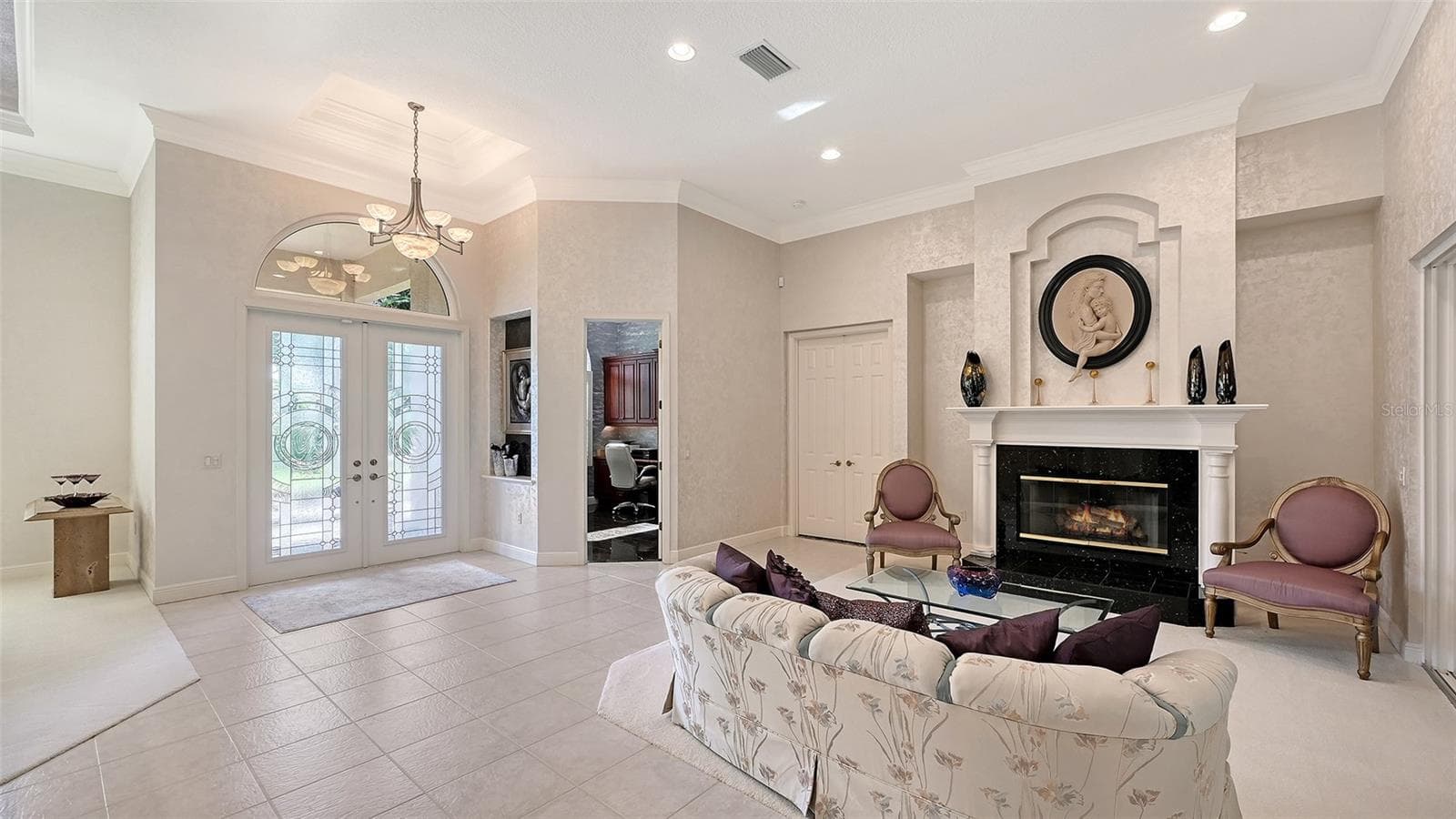 Separate Living Room with fireplace. - 8866 BLOOMFIELD BLVD, SARASOTA