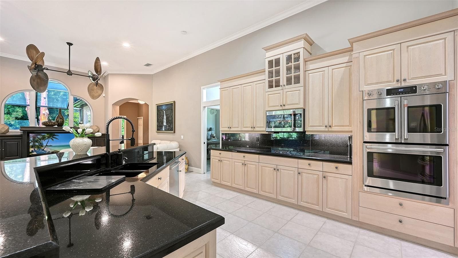 Kitchen with abundant cabinetry. - 8866 BLOOMFIELD BLVD, SARASOTA