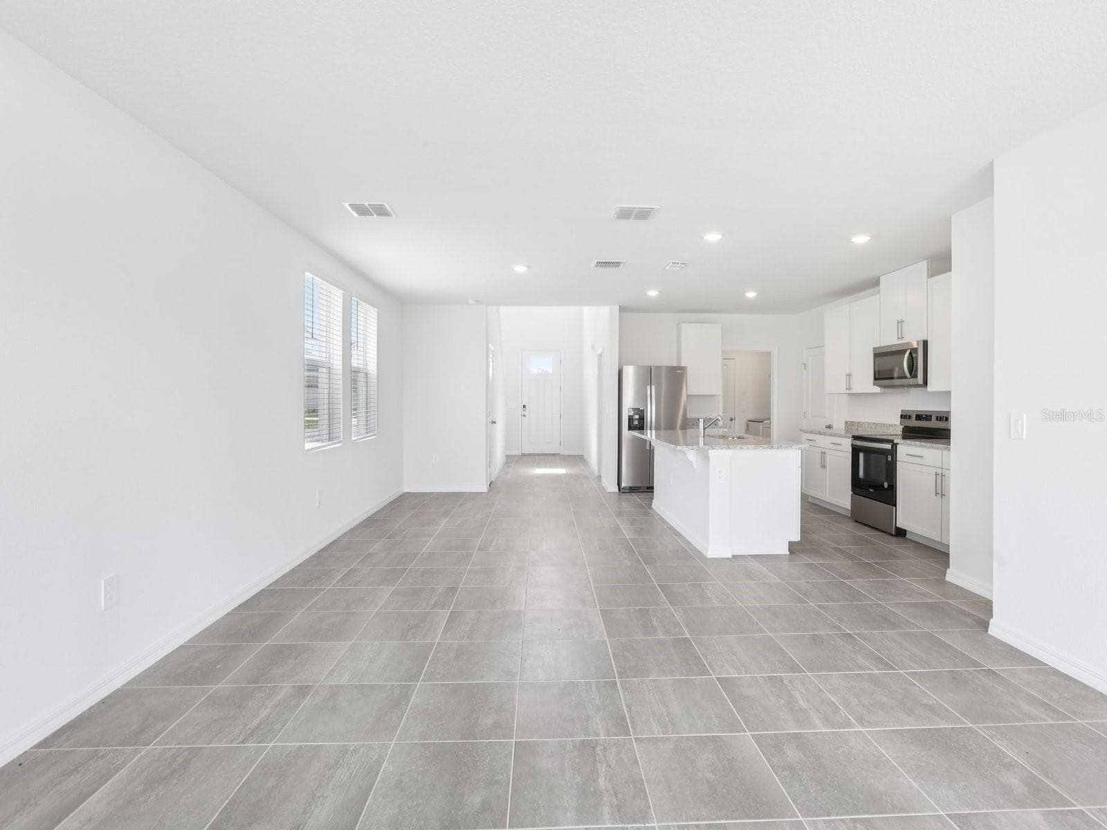 Photo is not of the actual home, but is an inspirational photo of builder’s model home and may depict options, furnishings, and/or decorator features that are not included - 11341 BELLEWOOD TER, PARRISH