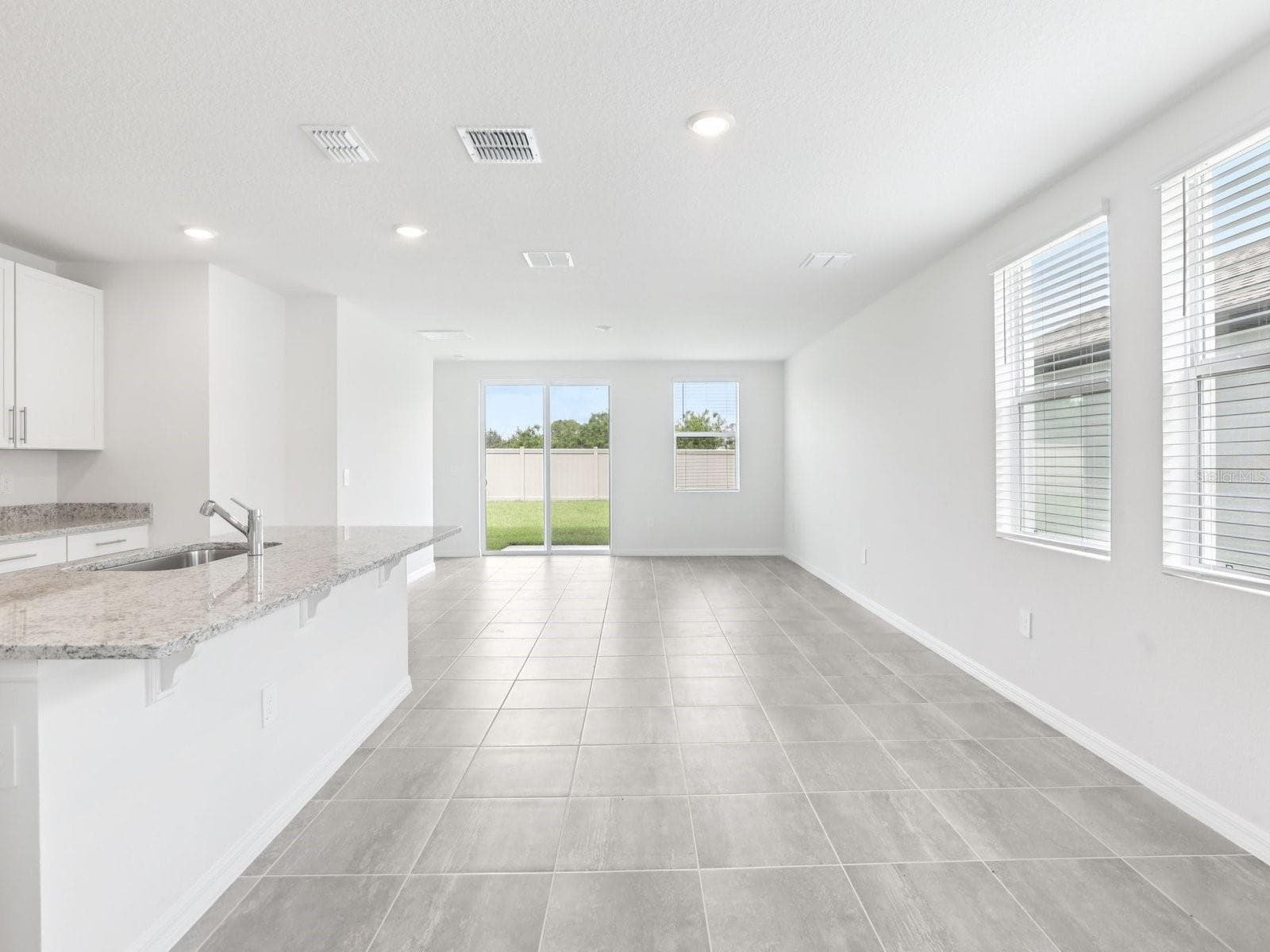 Photo is not of the actual home, but is an inspirational photo of builder’s model home and may depict options, furnishings, and/or decorator features that are not included - 11341 BELLEWOOD TER, PARRISH