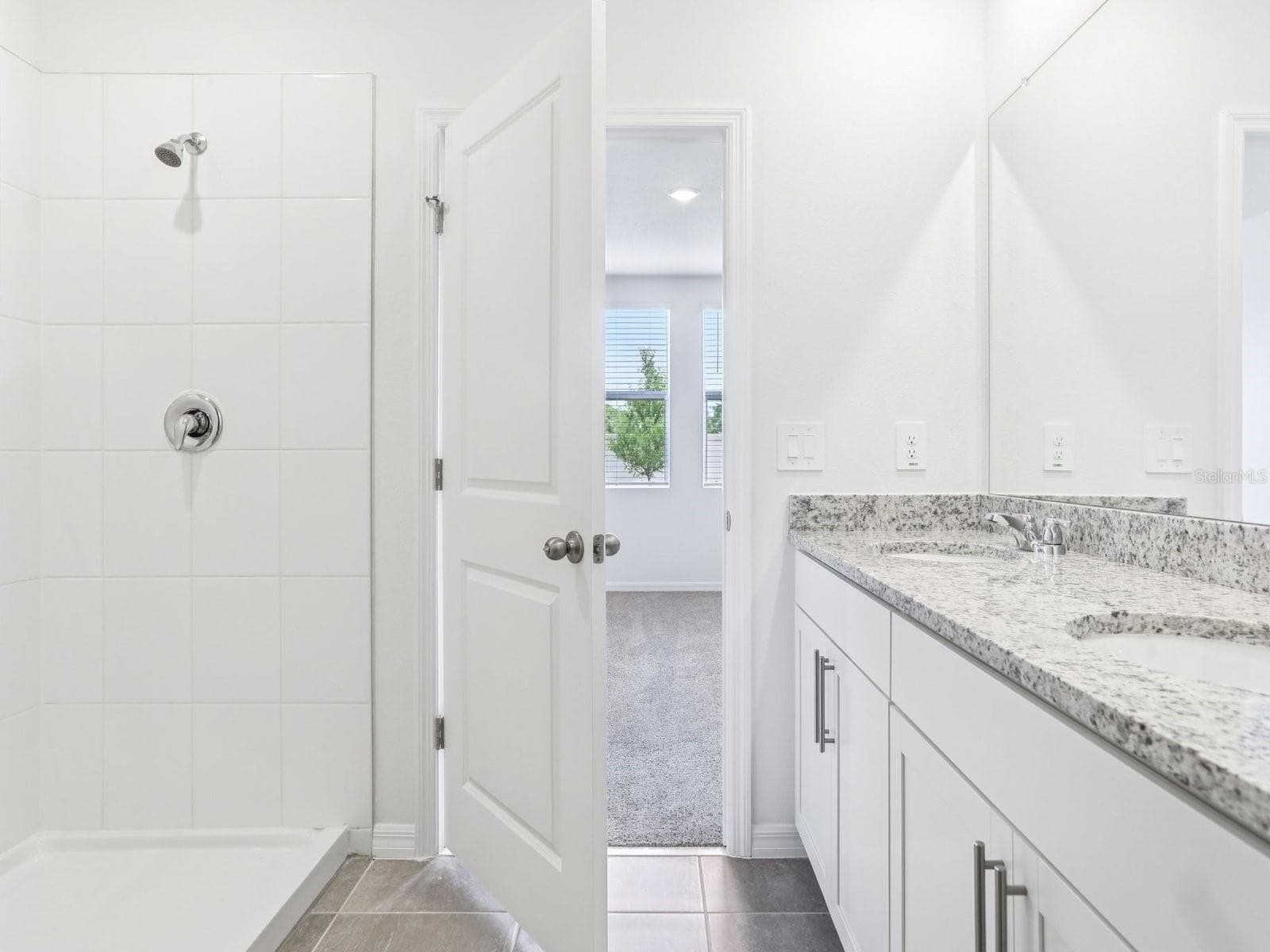 Photo is not of the actual home, but is an inspirational photo of builder’s model home and may depict options, furnishings, and/or decorator features that are not included - 11341 BELLEWOOD TER, PARRISH
