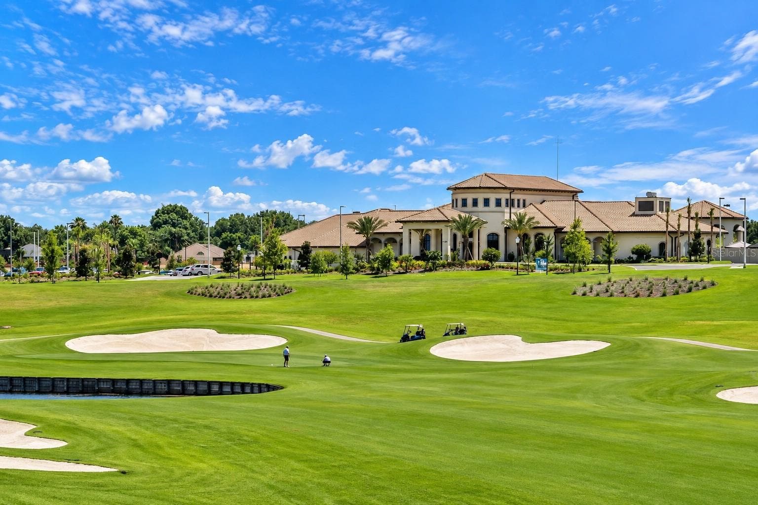 ChampionsGate golf course featuring beautifully maintained fairways, water views and championship-style play. - 1516 BUNKER DR, DAVENPORT