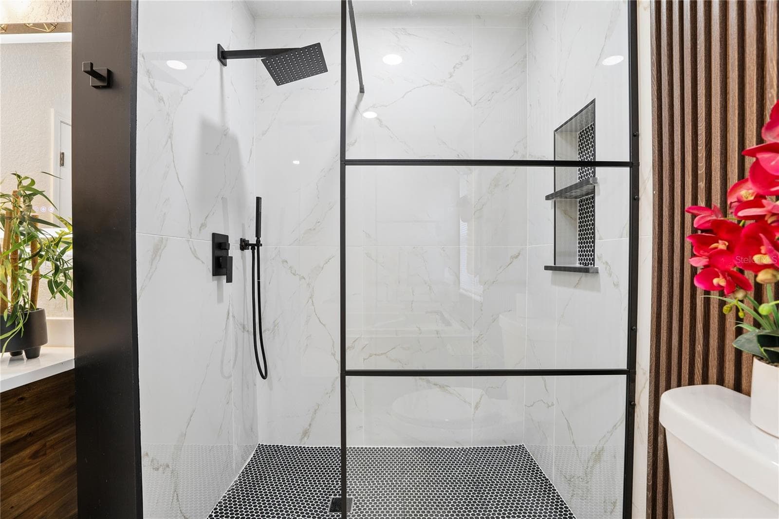 Separate glass-enclosed walk-in shower with rainfall showerhead - 1718 CAMPBELL AVE, ORLANDO