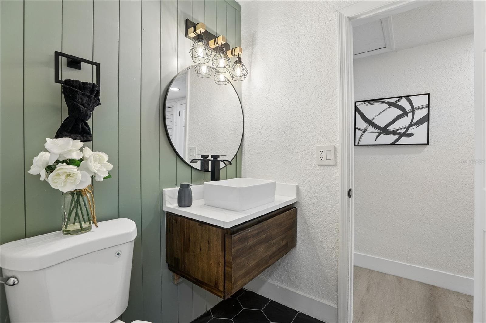 Beautifully redesigned second full bathroom with warm wood accents - 1718 CAMPBELL AVE, ORLANDO
