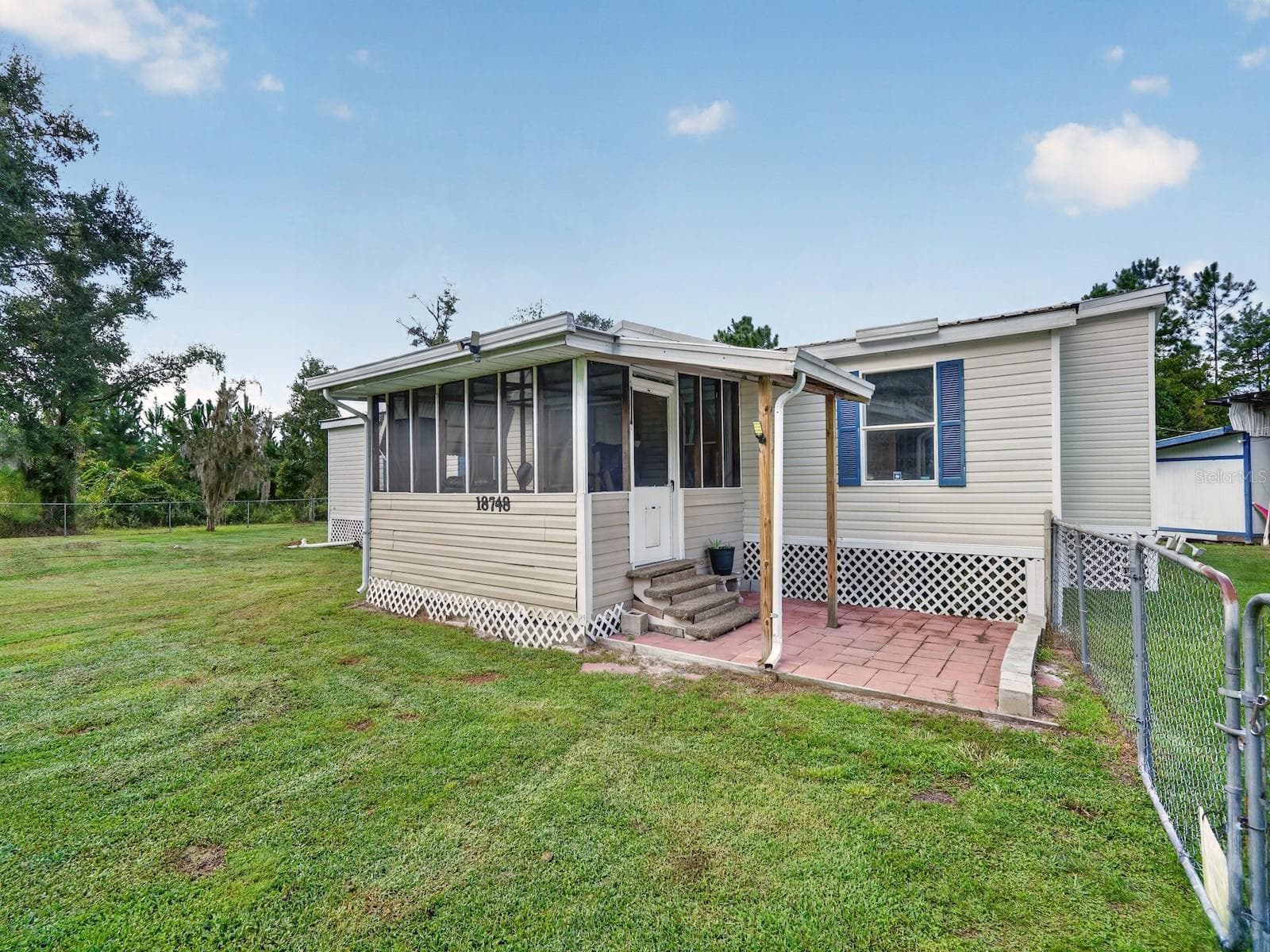 Manufactured Home at 18748 NE 148TH TERRACE RD, FORT MC COY, photo 6 of 53