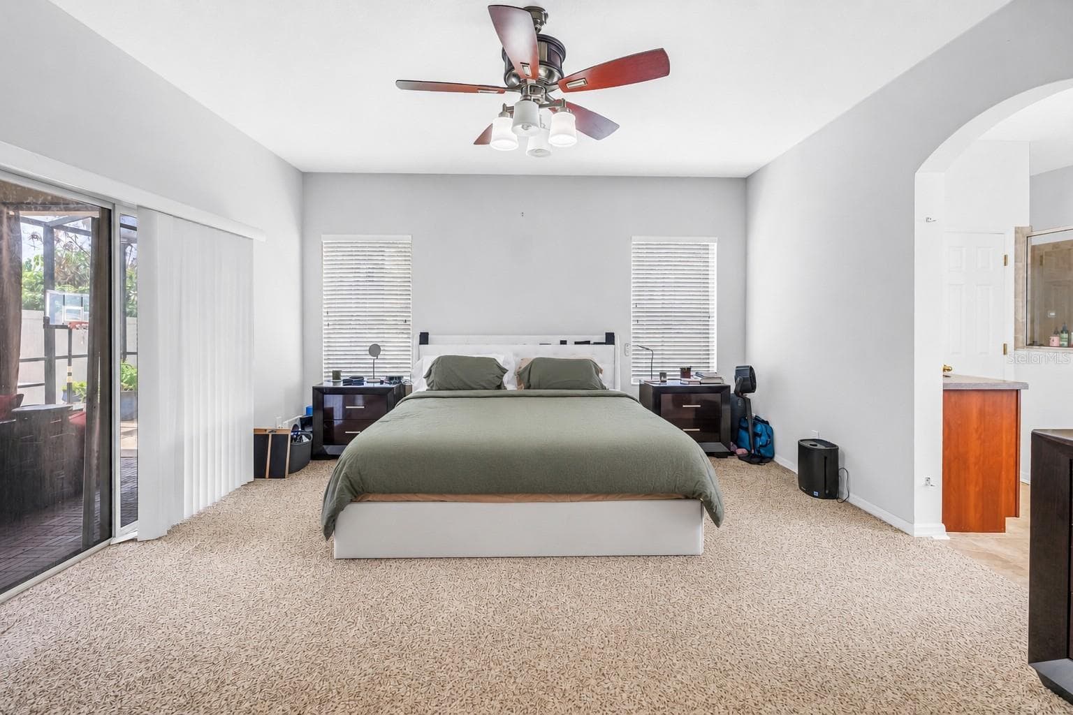 Primary Bedroom With Sliders to Covered Lanai - 7717 TANGLE BROOK BLVD, GIBSONTON