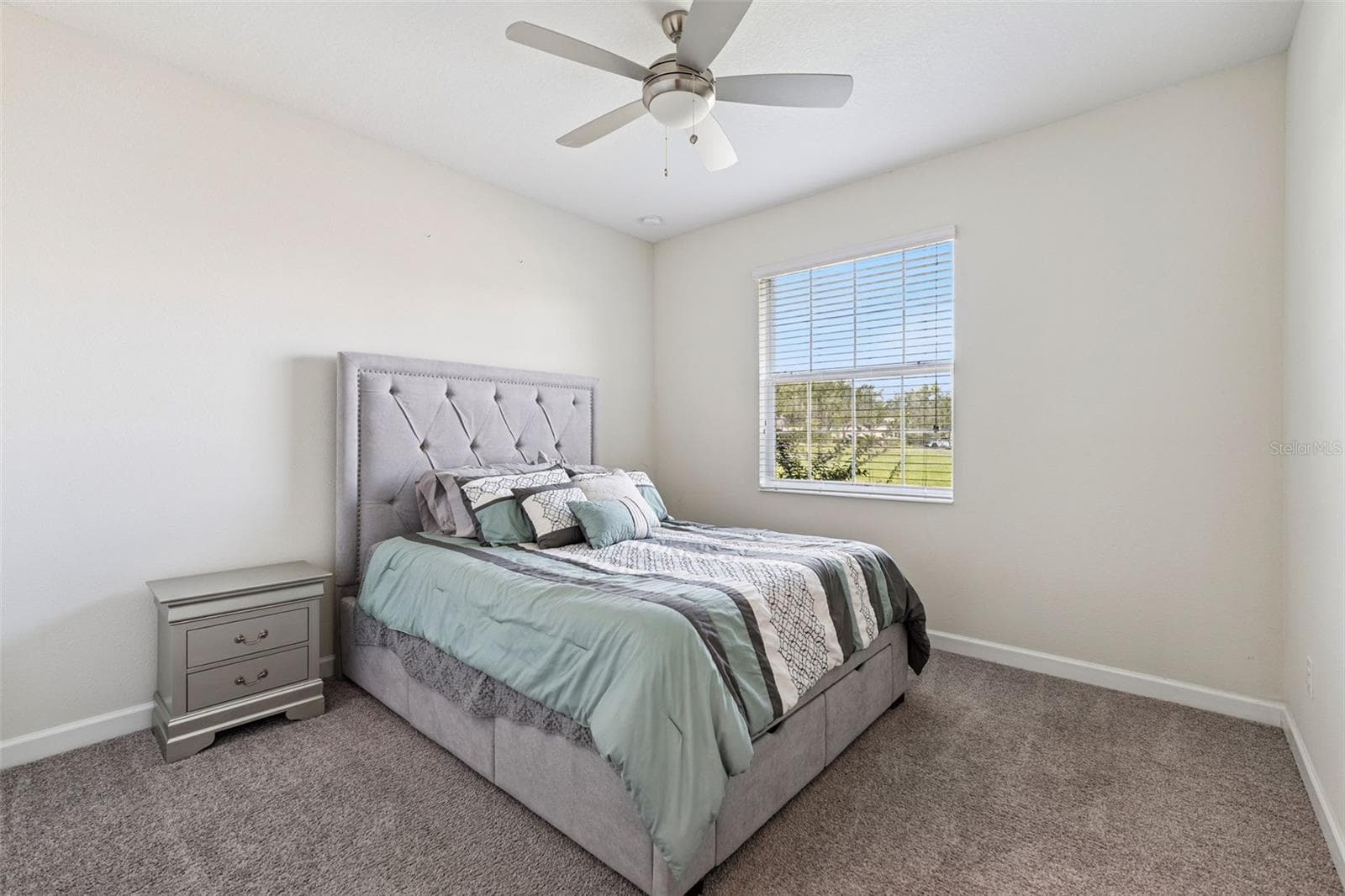 Bedroom 2 features views of Lake Ruby - 4075 BEDFORD AVE, WINTER HAVEN