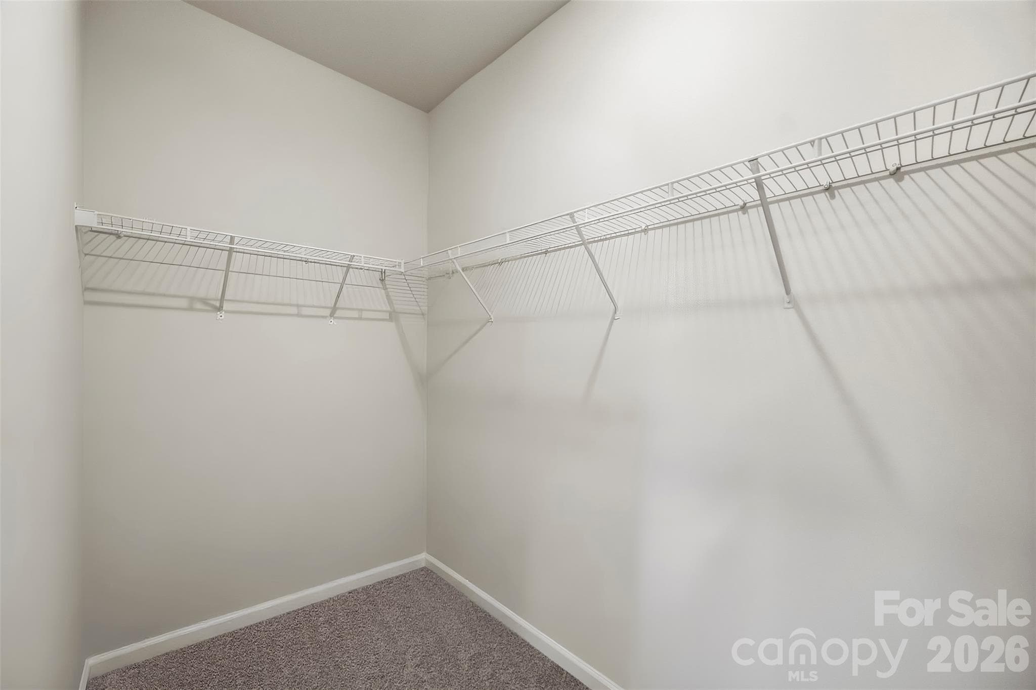 Primary BR walk-in closet. - 1734 Otter Perch Lane, Fort Mill