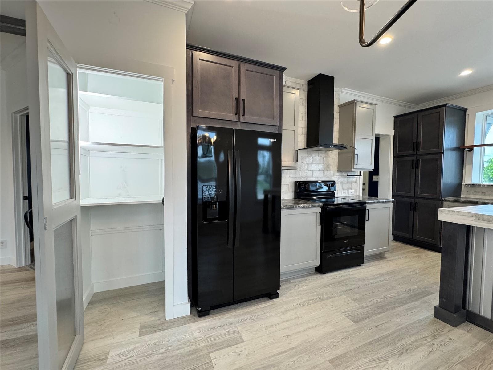 Lighted pantry closet. - 9248 SCEPTER AVE, BROOKSVILLE
