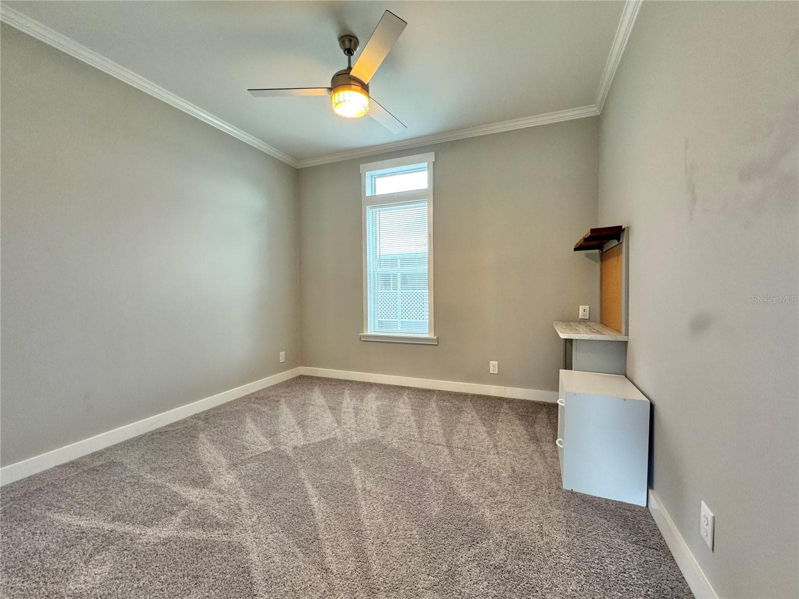 Bedroom 2 with built-in desk. - 9248 SCEPTER AVE, BROOKSVILLE