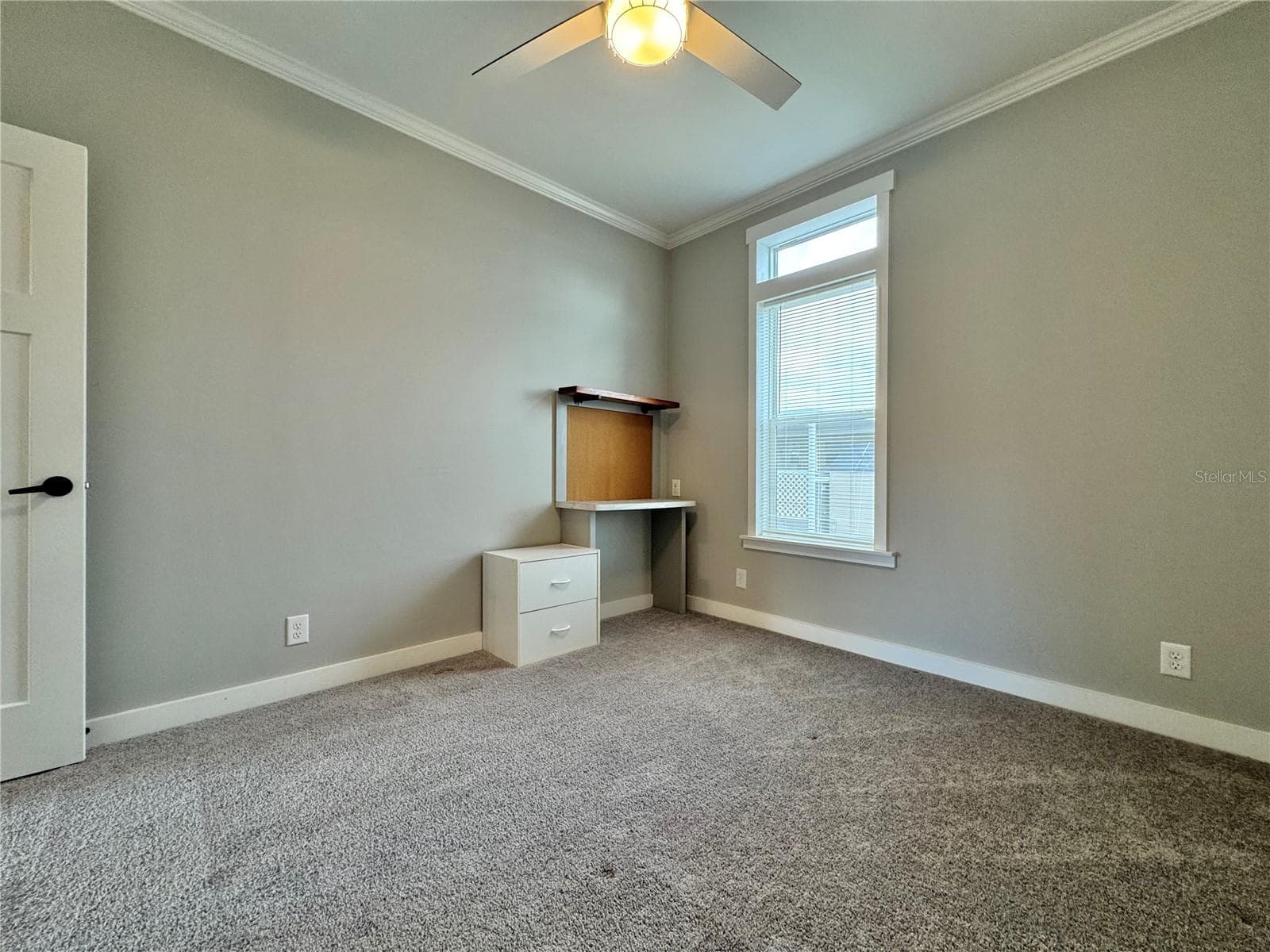 bedroom 3 with built-in desk. - 9248 SCEPTER AVE, BROOKSVILLE