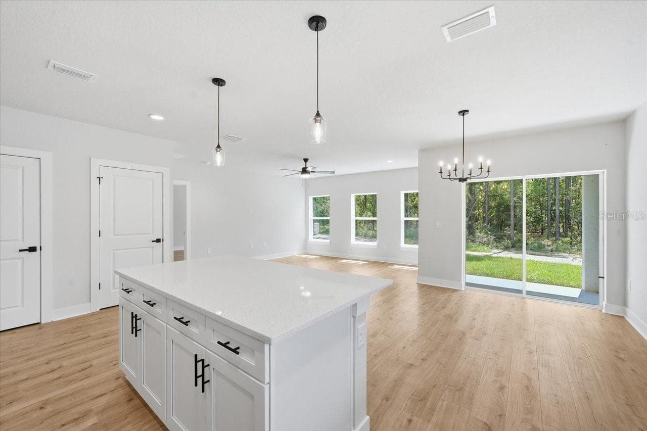Single Family Residence at 13014 DOWNY WOODPECKER RD, WEEKI WACHEE, photo 8 of 27