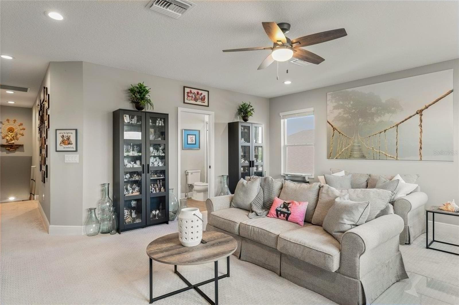 Upstairs loft: Flexible use options for the loft area —perfectly positioned beside the Jack-and-Jill bathroom and bonus bedroom. - 10625 FALLING LEAF CT, PARRISH