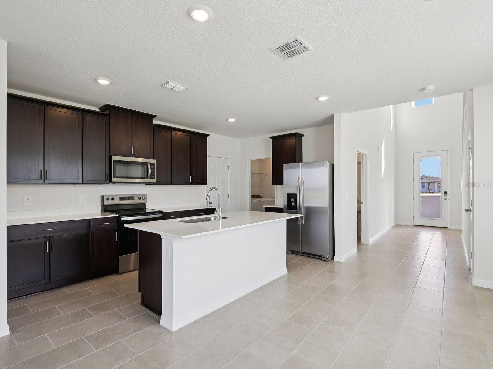 Photo is not of the actual home, but is an inspirational photo of builder’s model home and may depict options, furnishings, and/or decorator features that are not included - 3920 TEAK LN, BARTOW