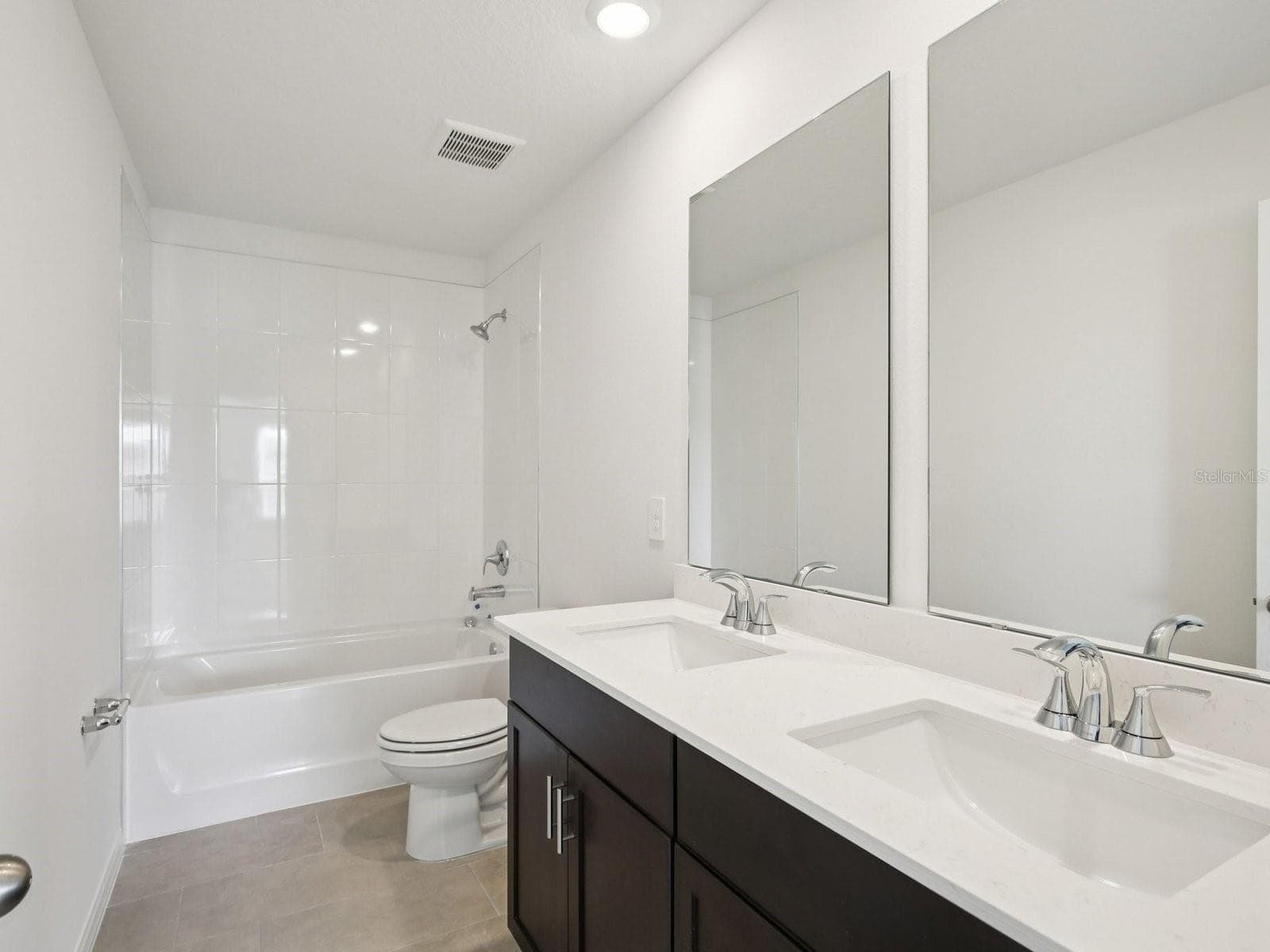 Photo is not of the actual home, but is an inspirational photo of builder’s model home and may depict options, furnishings, and/or decorator features that are not included - 3920 TEAK LN, BARTOW