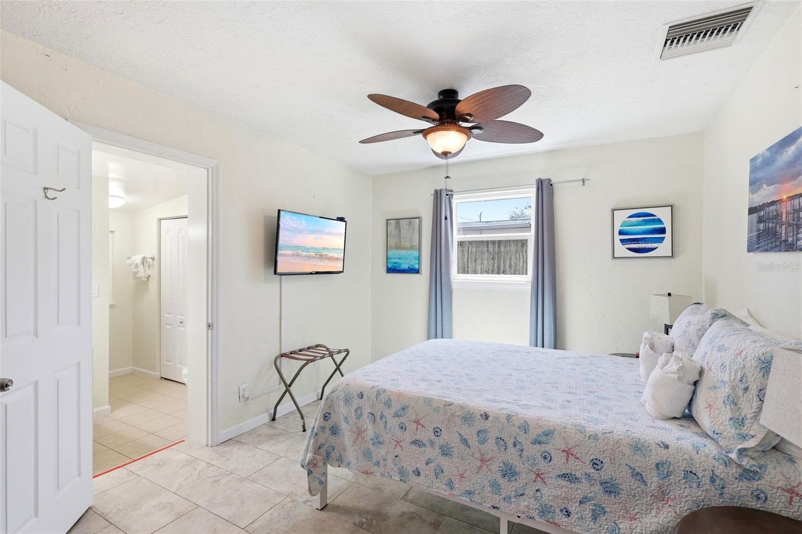 Primary Bedroom ensuite with walk in closet - 159 LAURIE DR, ORMOND BEACH