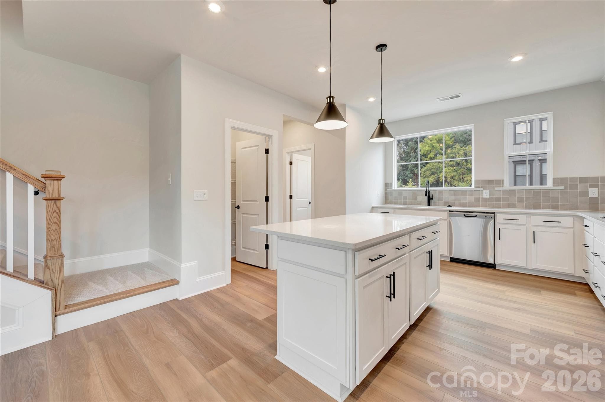 Light filled gourmet kitchen - 444 Old Town Village Road, Waxhaw