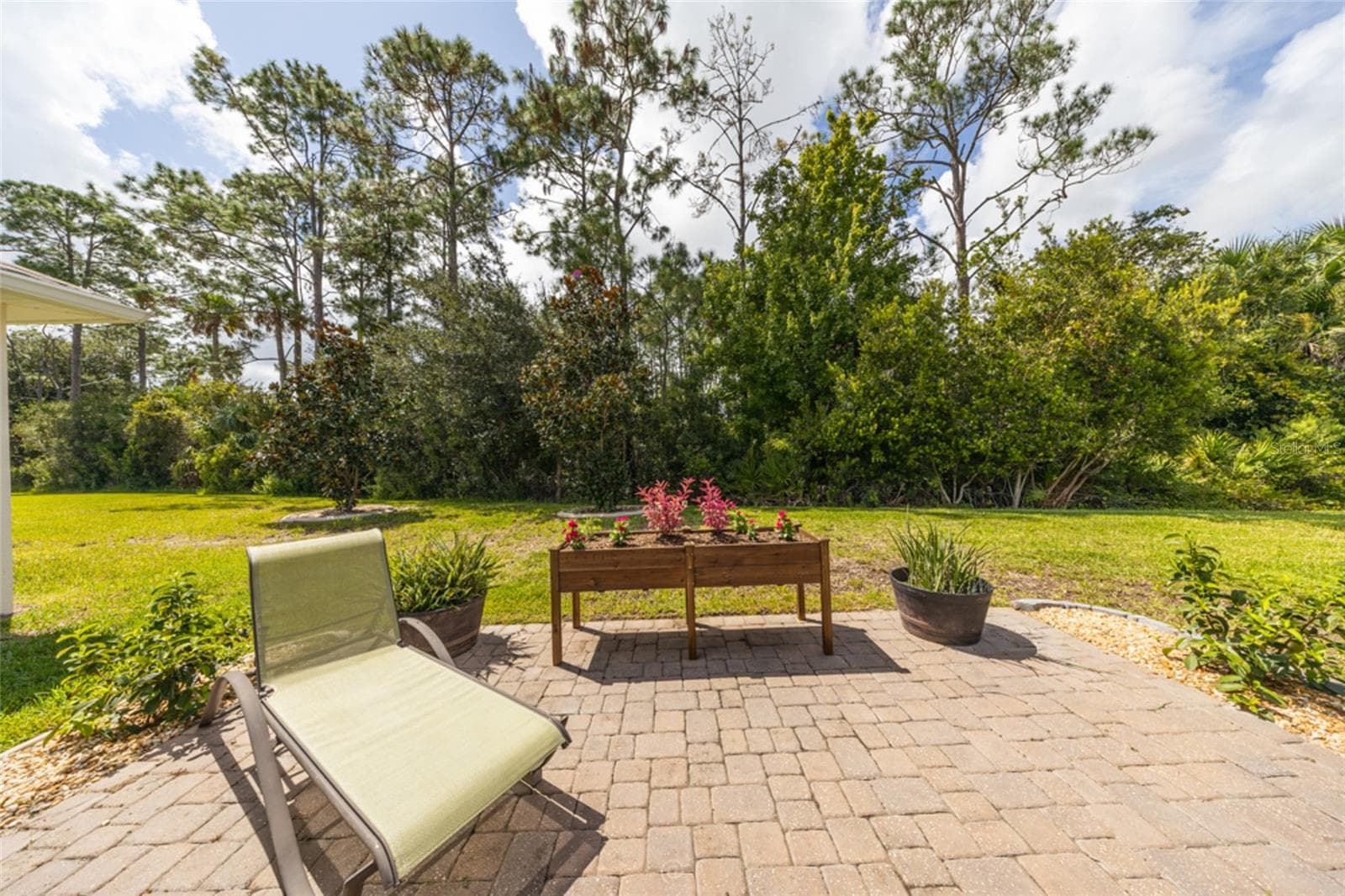 Extended patio with pavers - 155 PARK PLACE CIR, PALM COAST