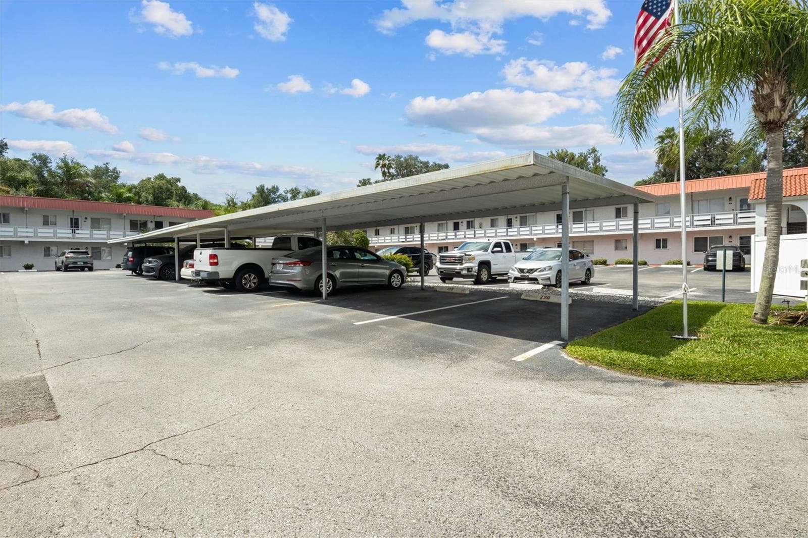 Covered assigned parking - 1100 MARTINIQUE DR #220, WINTER HAVEN