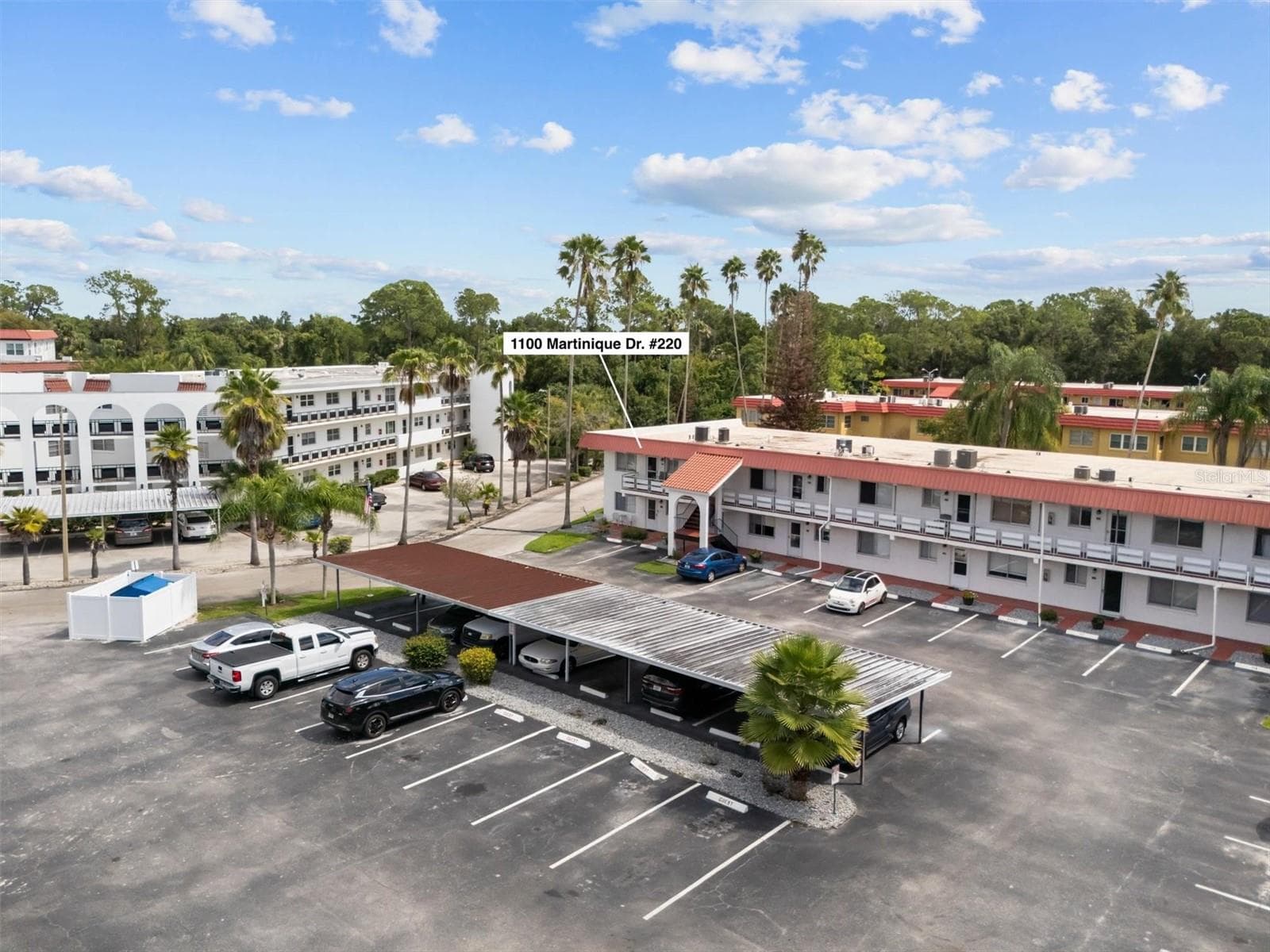 Front exterior/Covered parking - 1100 MARTINIQUE DR #220, WINTER HAVEN