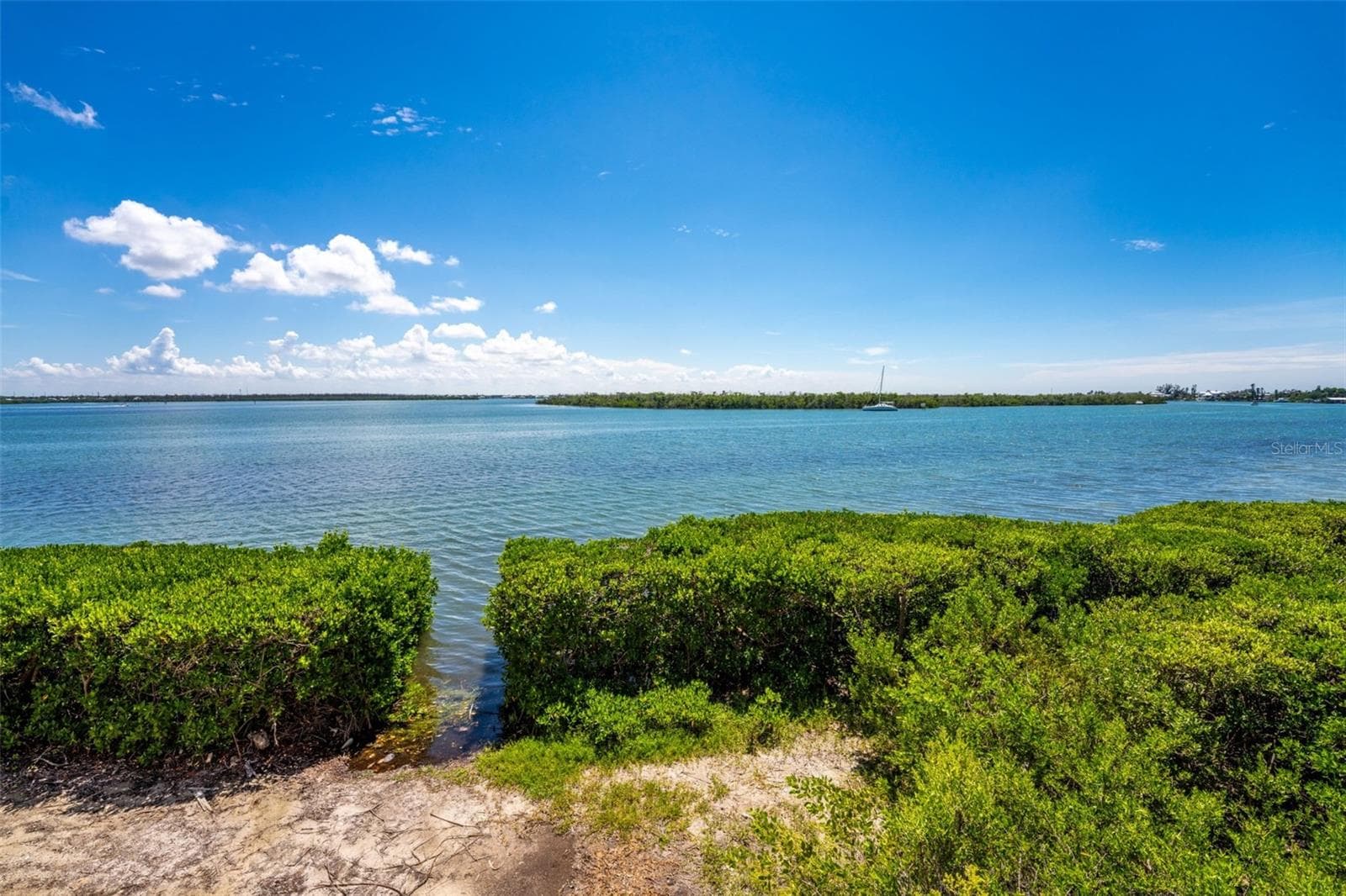 Kayak launch opening below deck. - 1751 BEACH RD #202, ENGLEWOOD