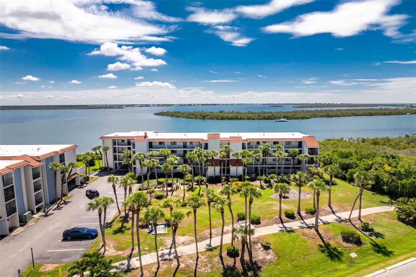 Sidewalk perfect for short walk to the beach. - 1751 BEACH RD #202, ENGLEWOOD