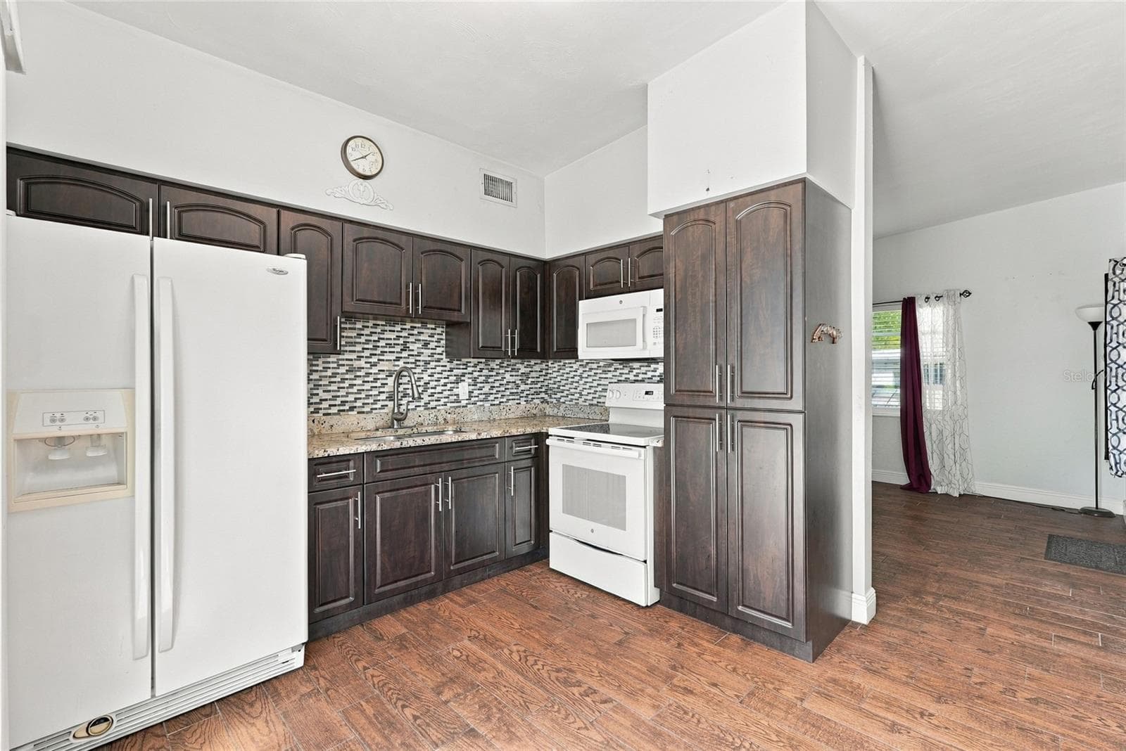 Kitchen with pantry, microwave, range, refrigerator - 10594 104TH AVE, LARGO