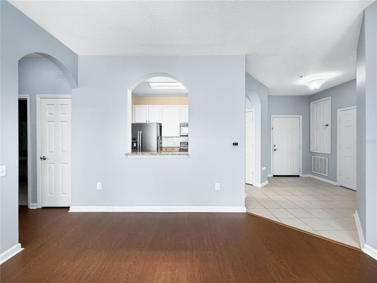 View into kitchen & foyer areas. - 6434 CAVA ALTA DR #105, ORLANDO