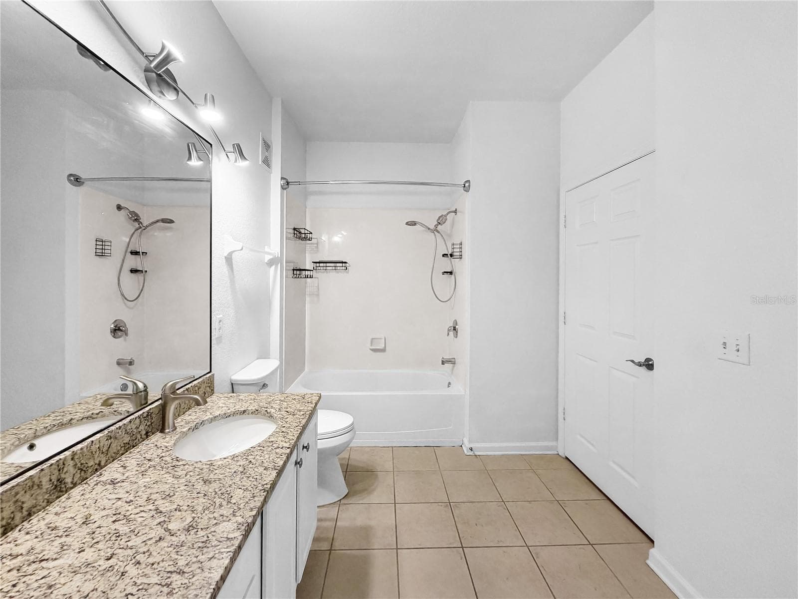 Guest Bathroom. Lots of counter space. Large mirror. - 6434 CAVA ALTA DR #105, ORLANDO