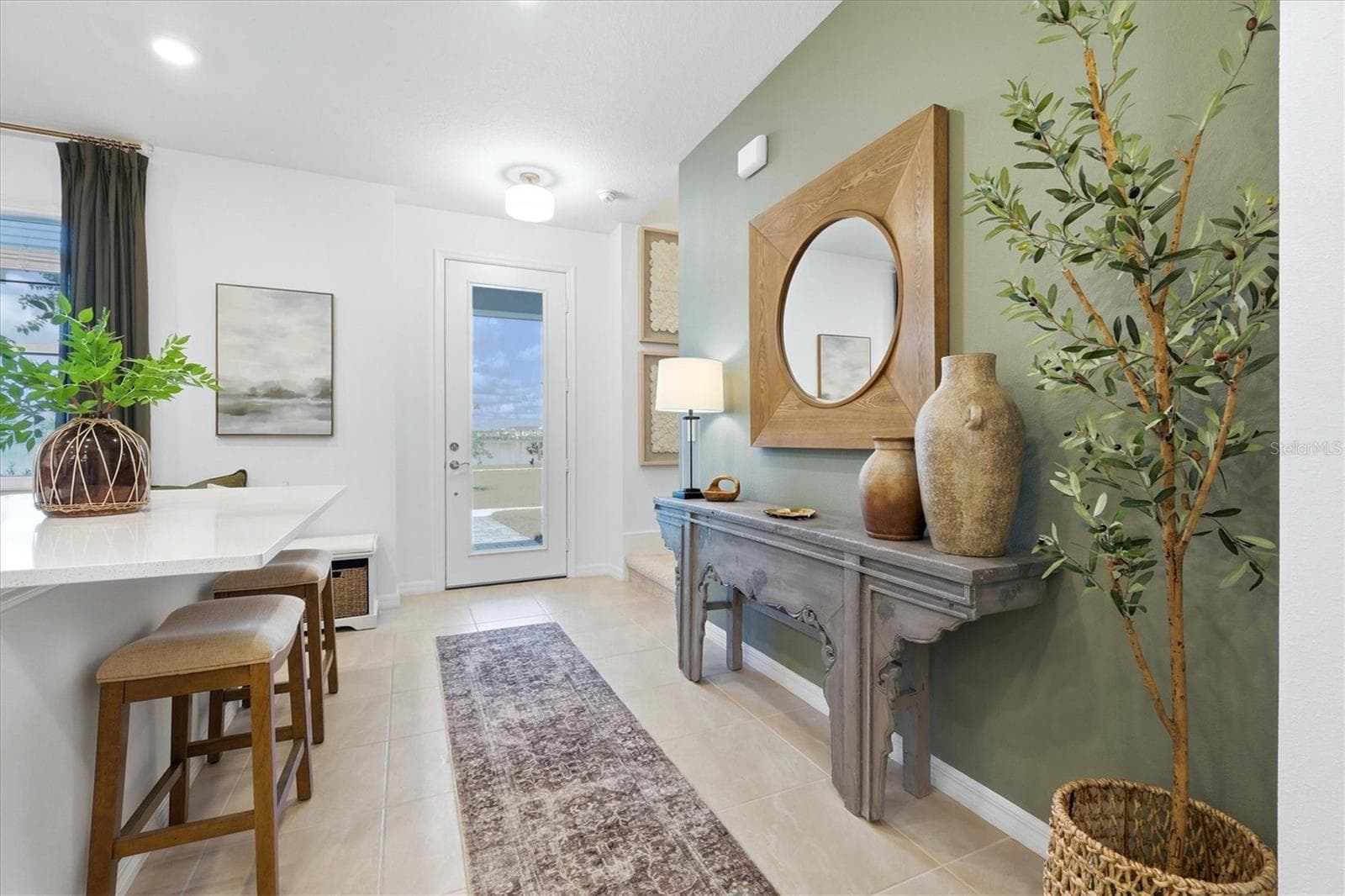 Foyer with view of Kingfisher Lake - 7392 CABIN LN, SARASOTA