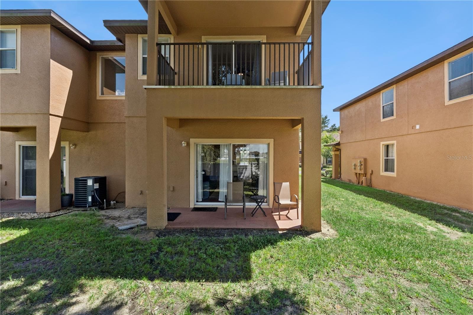 Back of townhome - 570 CALABRIA AVE, DAVENPORT