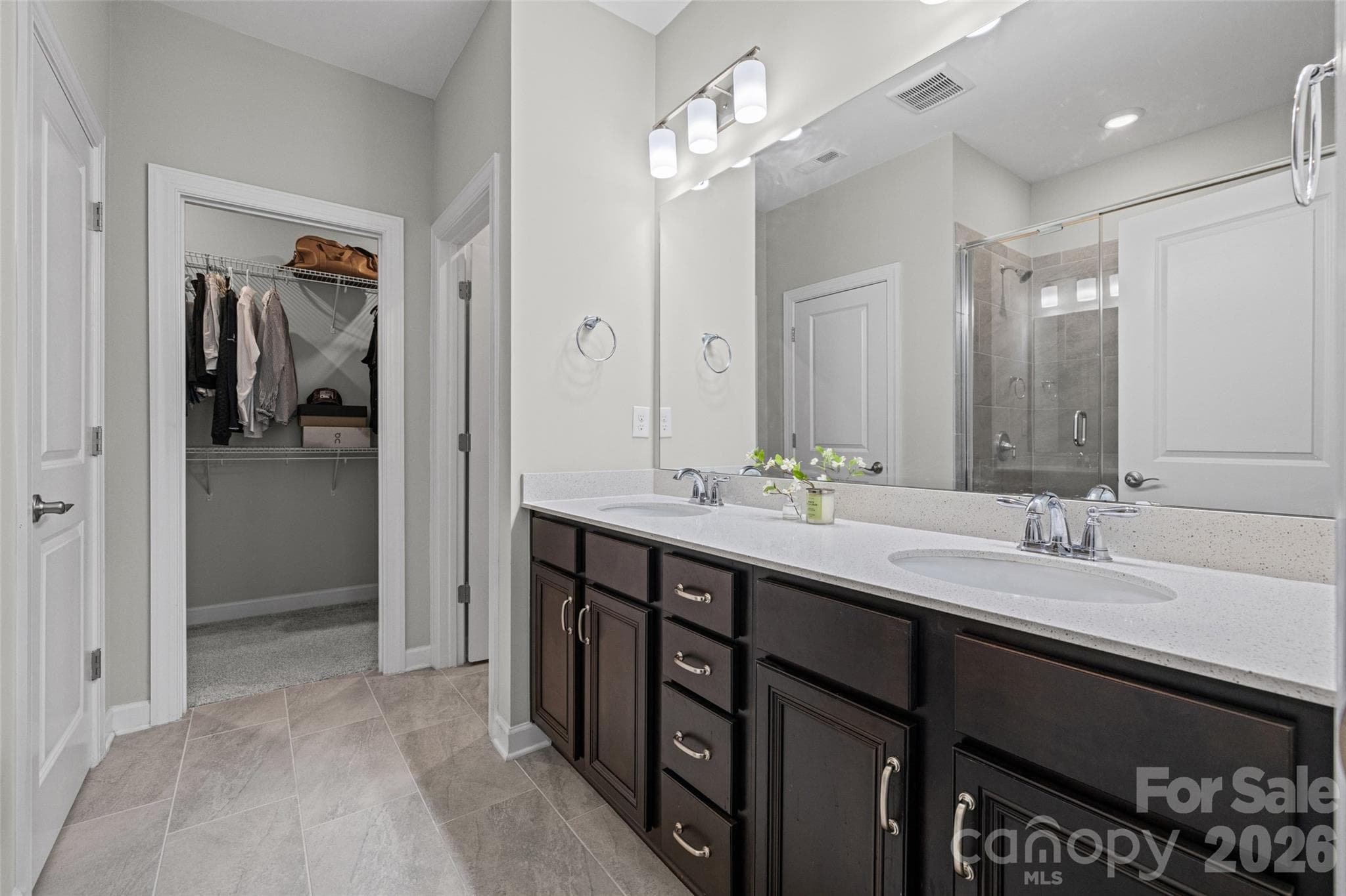 Look at this primary bathroom with large walk-in closet! - 14830 Batteliere Drive, Charlotte