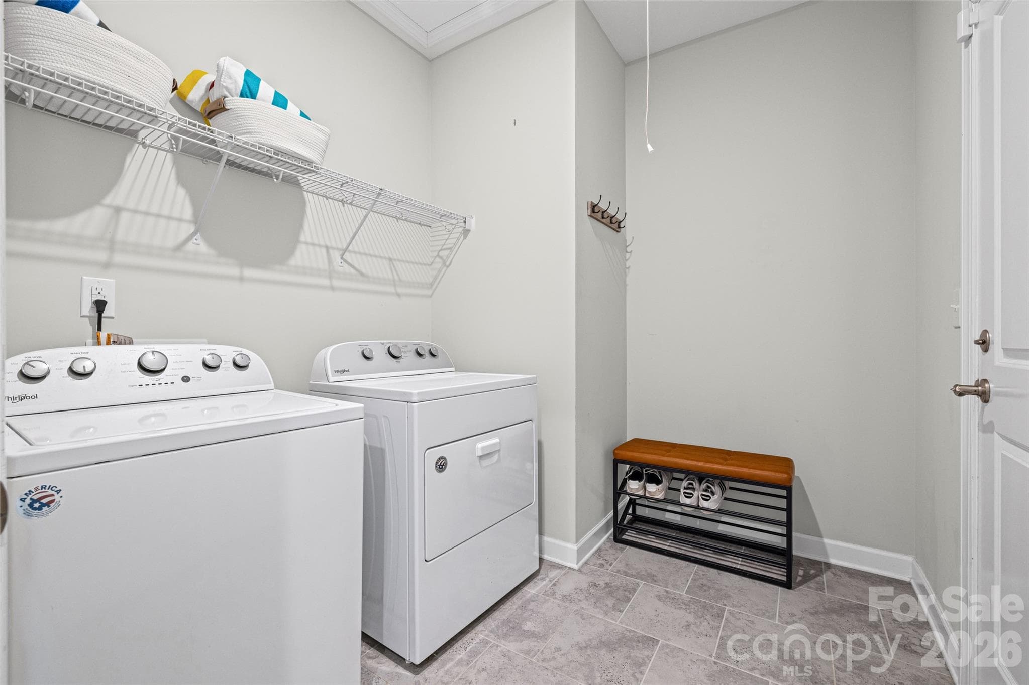 Large laundry room with jut-out for storage. - 14830 Batteliere Drive, Charlotte