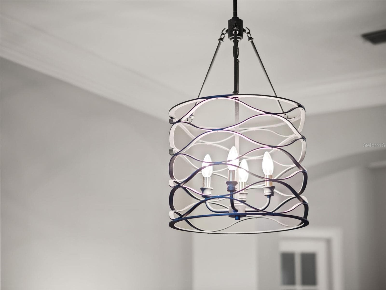 Light fixture in formal living room - 25535 HAWKS RUN LN, SORRENTO
