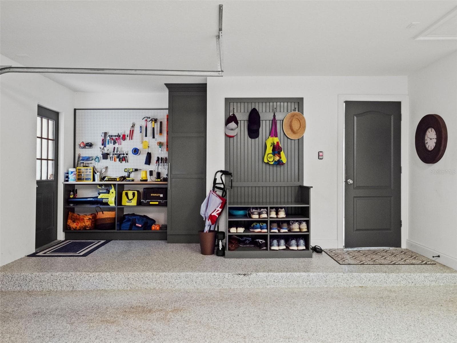 Built in work station and drop zone in garage - 25535 HAWKS RUN LN, SORRENTO