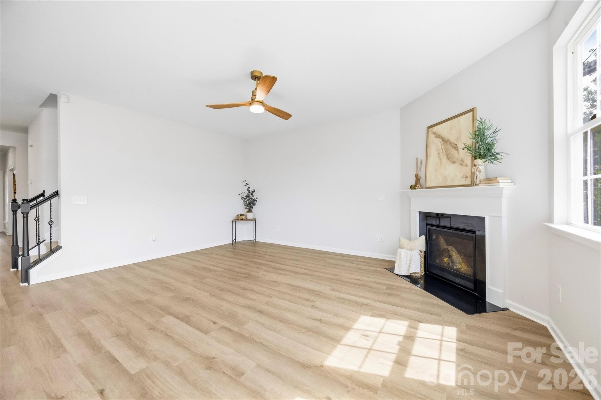 Expansive living area offers flexible furniture placement and highlights the home’s generous main-level footprint - 2015 Kensley Drive, Waxhaw