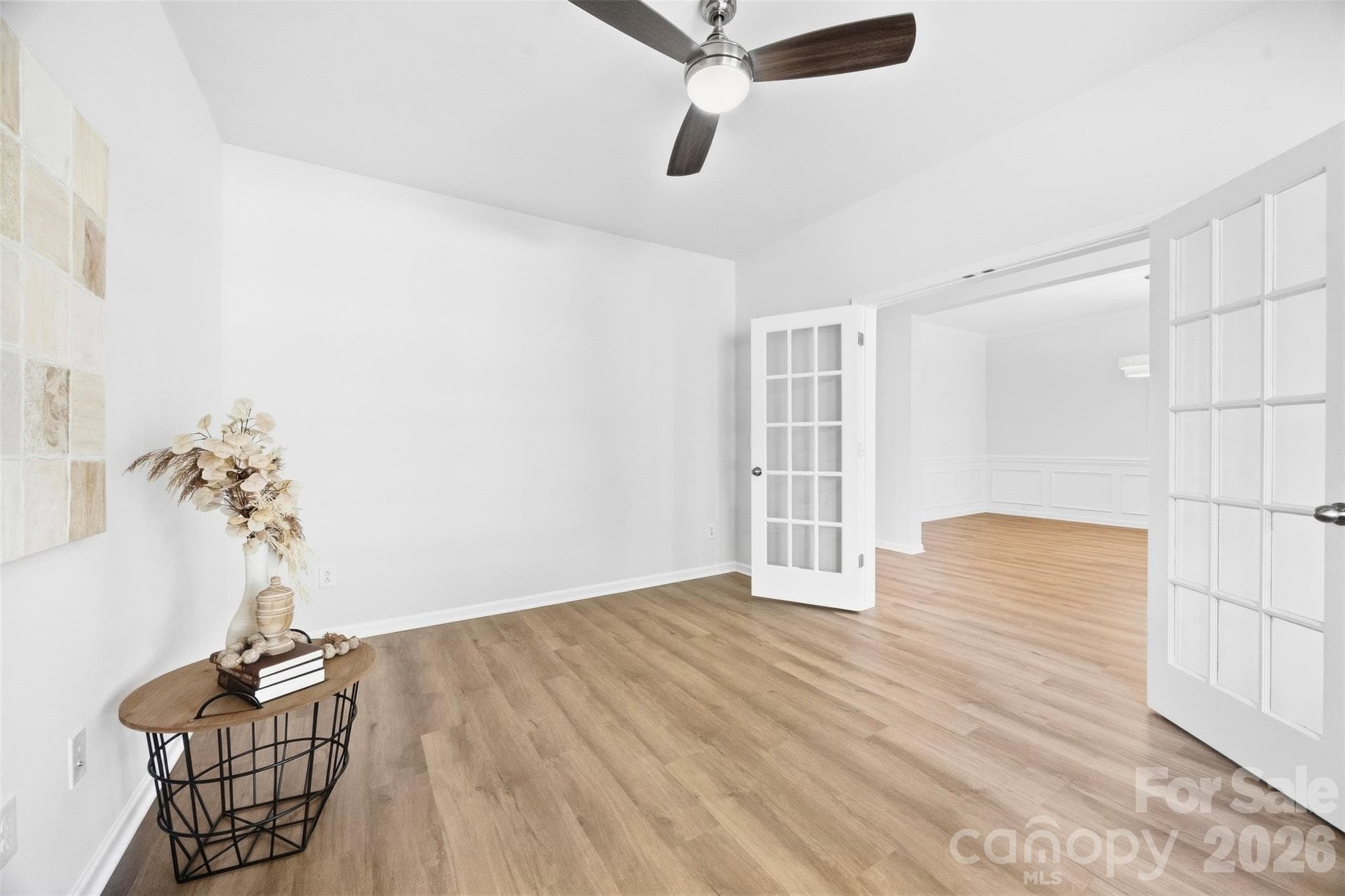 Beautifully refreshed main level features new LVP flooring throughout, fresh paint, and updated lighting for a bright, cohesive look - 2015 Kensley Drive, Waxhaw