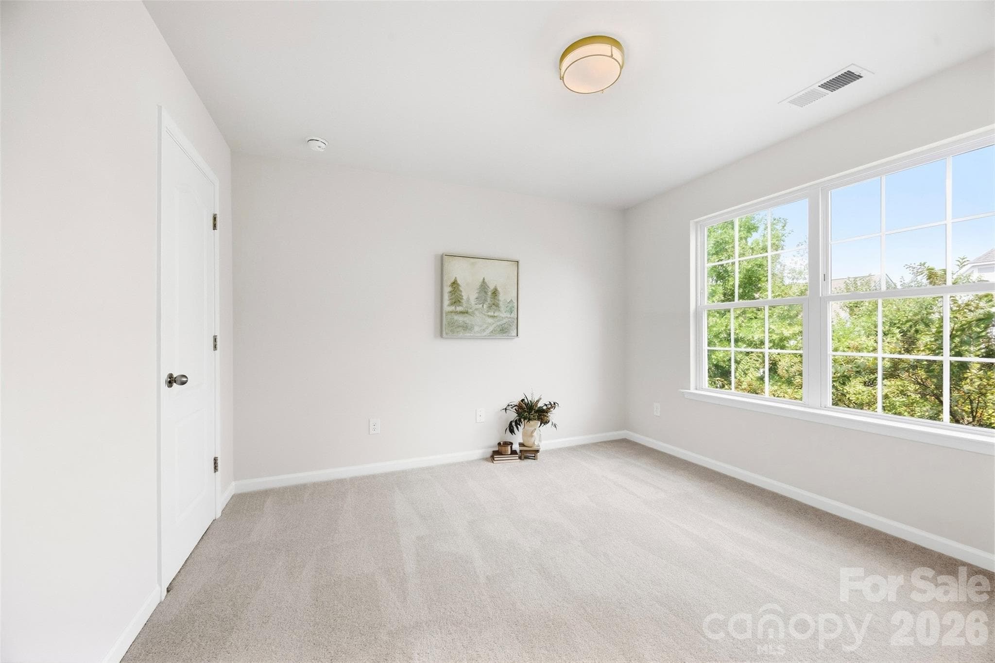 Bedrooms has been refreshed with new carpet, fresh paint, and a new light fixture - 2015 Kensley Drive, Waxhaw