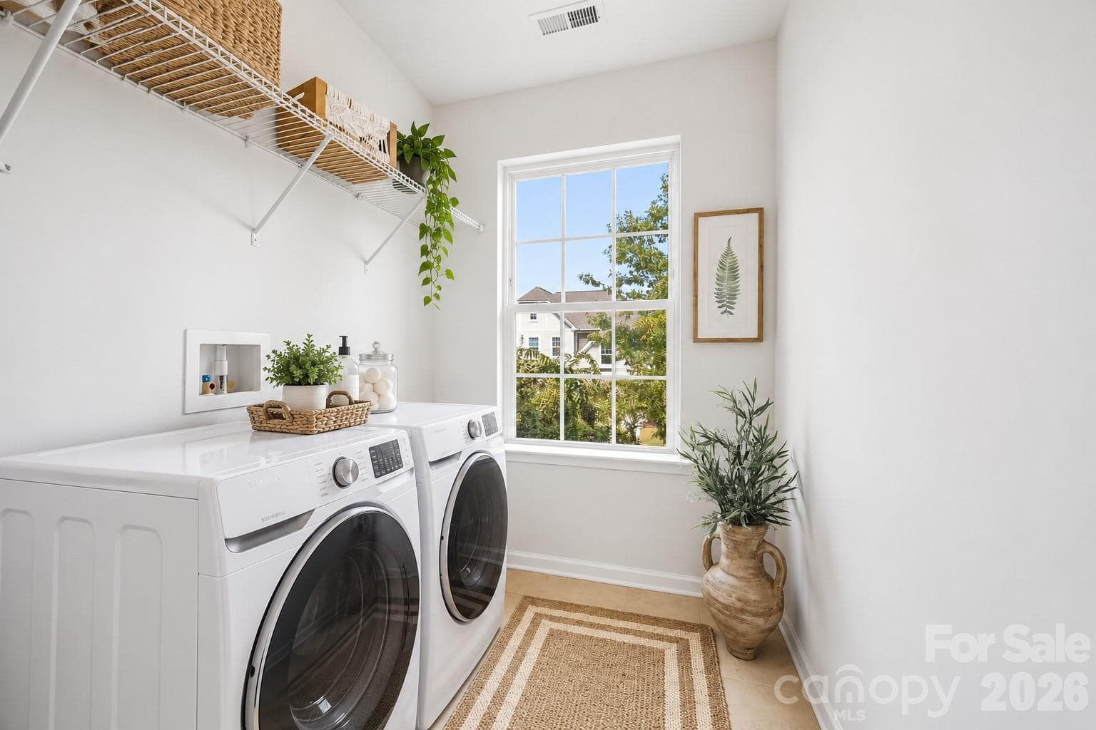 Convenient upstairs laundry room location - 2015 Kensley Drive, Waxhaw