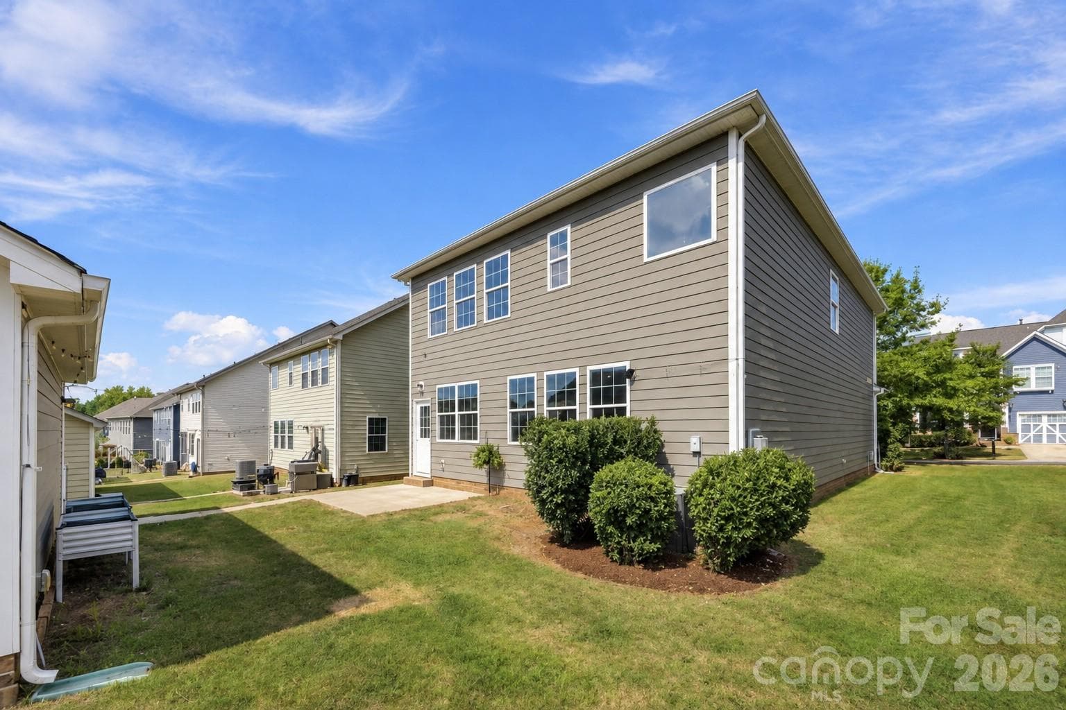 Patio just off the main living area and access to detached garage - 2015 Kensley Drive, Waxhaw
