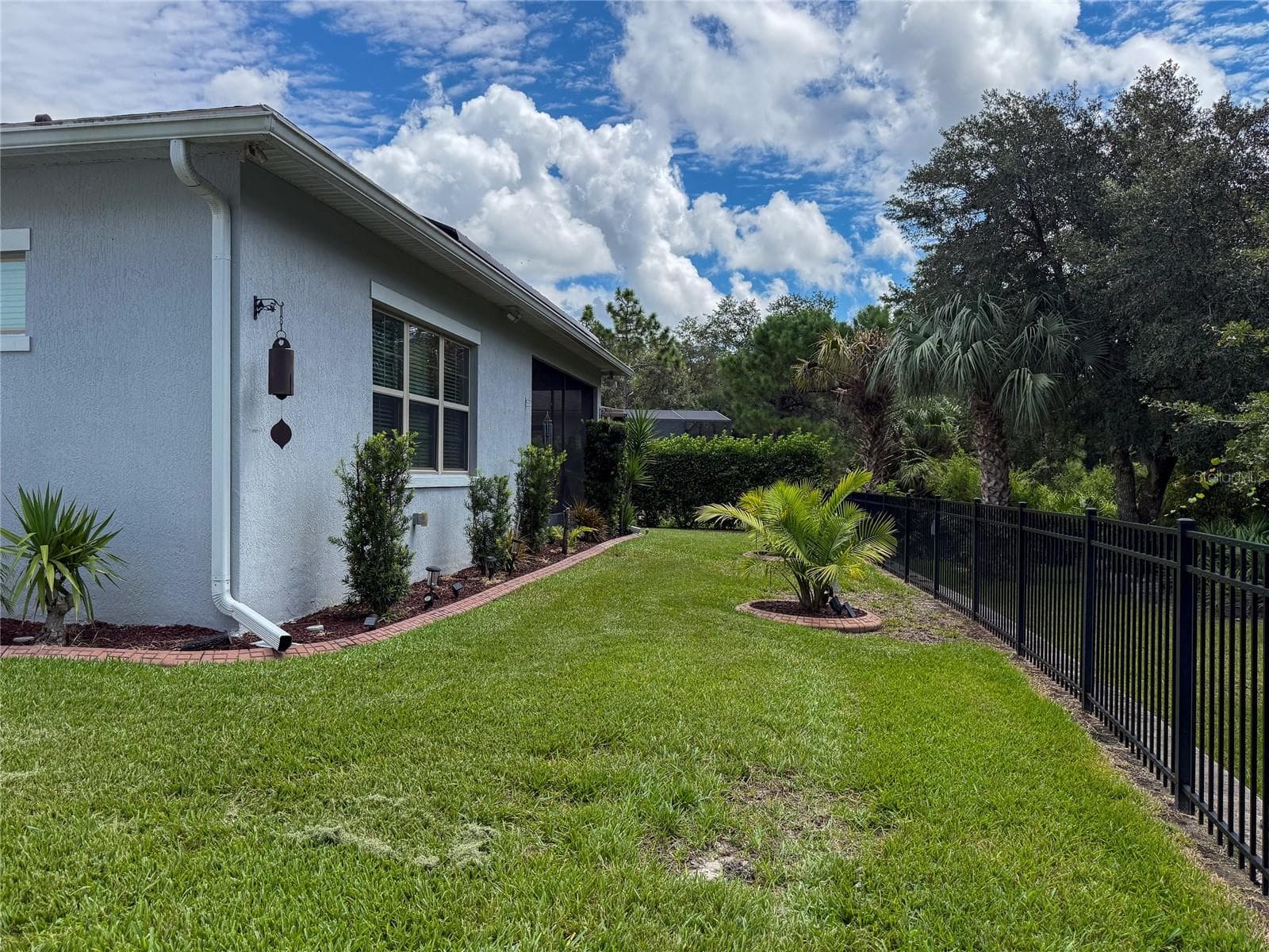 BACKYARD REAR VIEW FROM LEFT SIDE VIEW - 14150 ALAFAYA OAK BND, ORLANDO