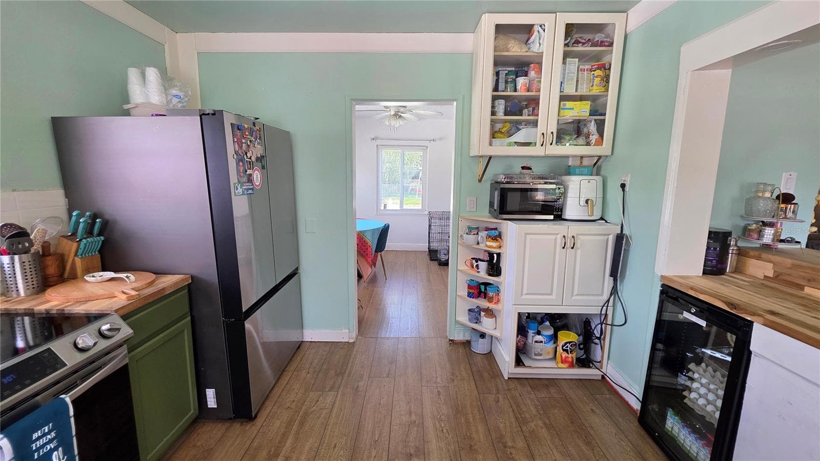 Kitchen adjacent to Dining/Flex Room, Laminate Flooring - 1702 26TH ST W, BRADENTON